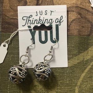 Silver tones round pretty earring very original